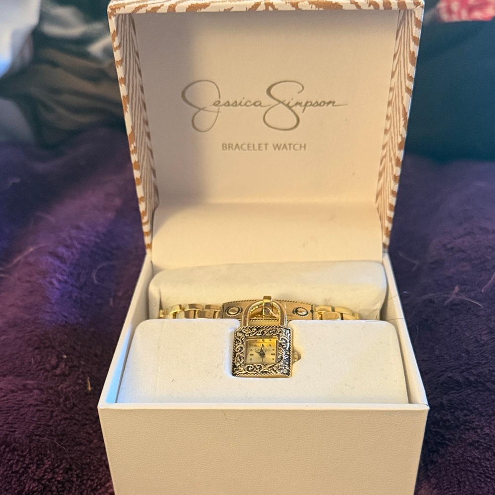 Jessica Simpson Gold Bracelet with Intricate Design